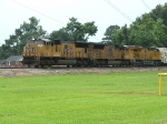 Southbound on a hot Sunday afternoon in rural Louisiana. This train included several Tropicana cars.